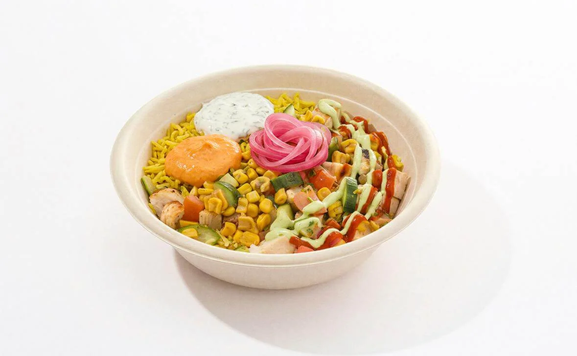 Rawk Mediterranean Chicken Bowl with rice, vegetables, pickled onion, and sauces