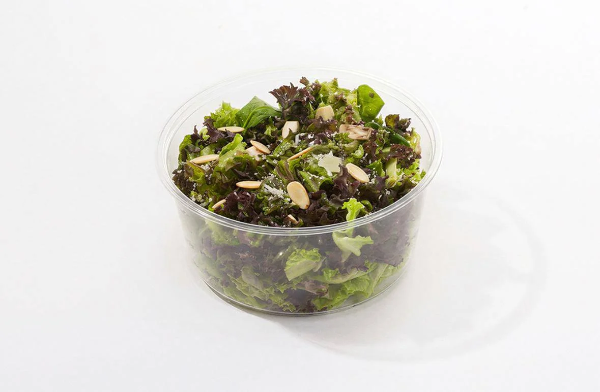 Rawk Balsamic Peach salad with leafy greens and sliced almonds
